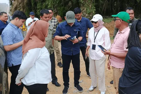 Kemenkopolhukam dan DPRD Kampar Meninjau PTPN IV