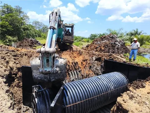 Solusi Modern Untuk Pengendalian Air di Perkebunan Kelapa Sawit Menggunakan Pipa Spiral dan Flap Gate