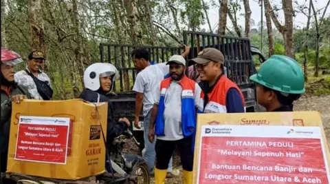 Gunakan Motor Trail Petani Sawit, PGN Bawa Bantuan ke Desa Terisolir di Aceh Tamiang